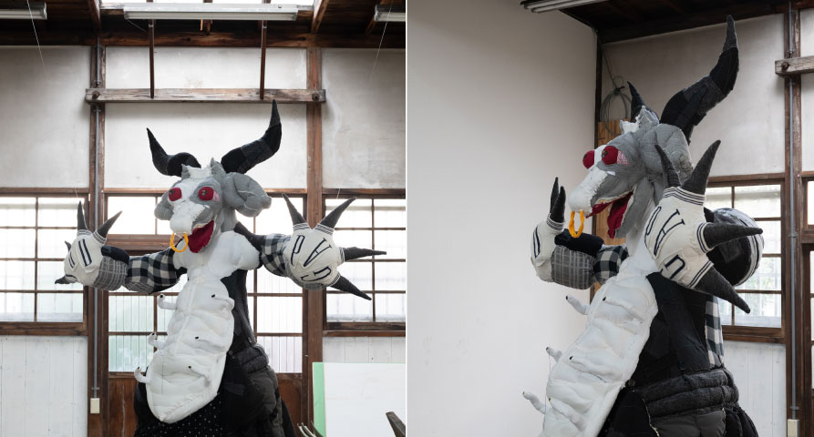 <p>八王子という街は広大で、多様な表情をもつ。牛頭天王・八王子権現の信仰や桑都・布の街としての歴史、山々に抱かれた自然、そして私自身が学生時代に過ごした記憶。<br />
私はその断片を古着や古布でつぎはぎし、ぬいぐるみの姿をしたクリーチャーへと仕立て上げる。布の履歴と対話し、街を思いながら織り成す存在は、神か悪魔か、あるいはもののけか。偶像として現れる異形を通じ、街と個人の記憶が交差する瞬間を探る。</p>
